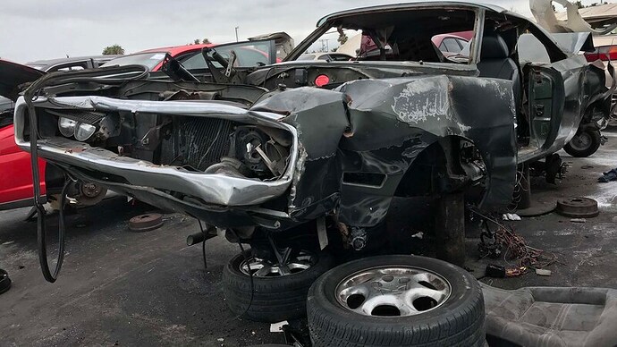 001-destroyed-1970-charger-in-junkyard