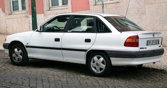 1994_Opel_Astra_1.4i_Sportive,rear_left(Portugal)