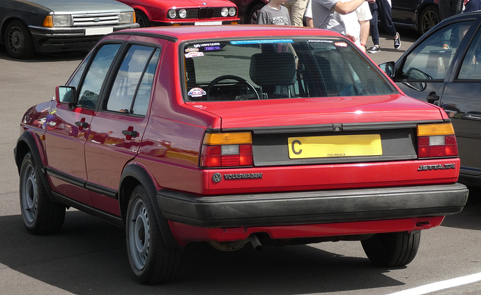 1986_Volkswagen_Jetta_TX_-1595cc_1.6(75PS)Petrol-Tornado_Red-_05-2024,_Rear