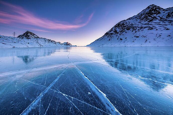 ice-cracks-in-the-frozen-lake-lucie-debelkova