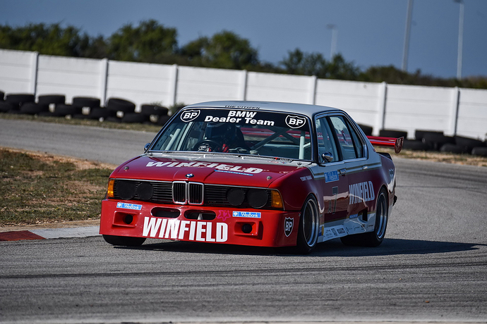 WM BMW 745i SA race car (E23) front-left 3/4