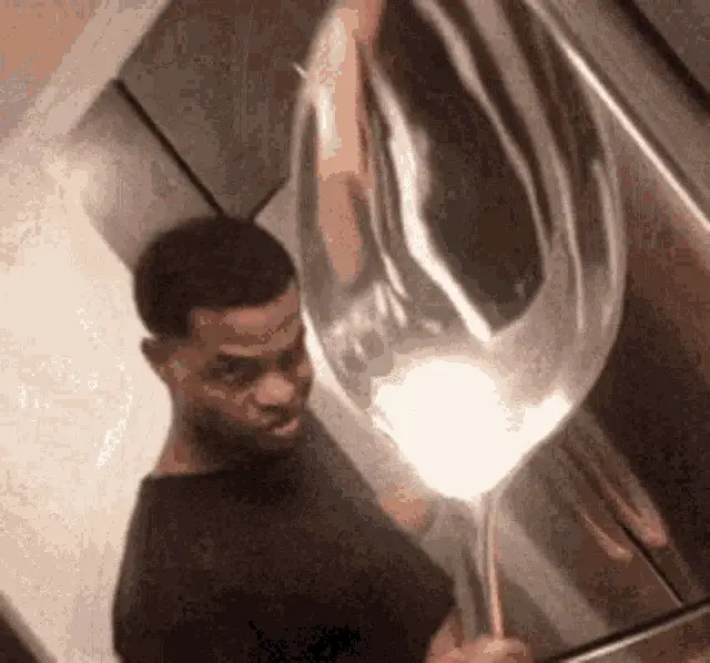 Man with Giant Spoon
