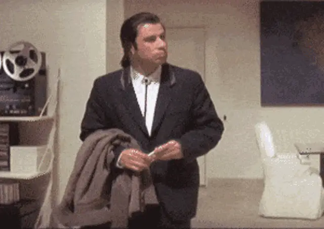 John Travolta Confused: What Huh