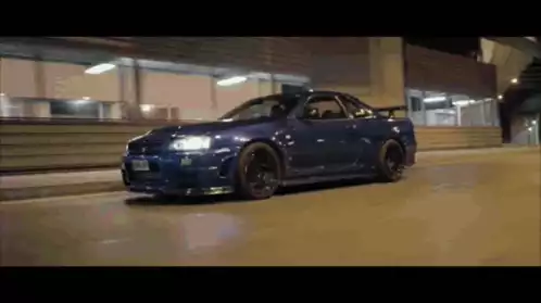 Blue Nissan Skyline GT-R R34 Night Drive